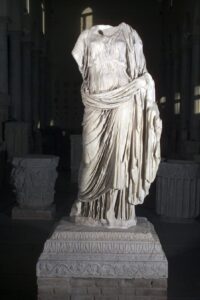 Headless female statue